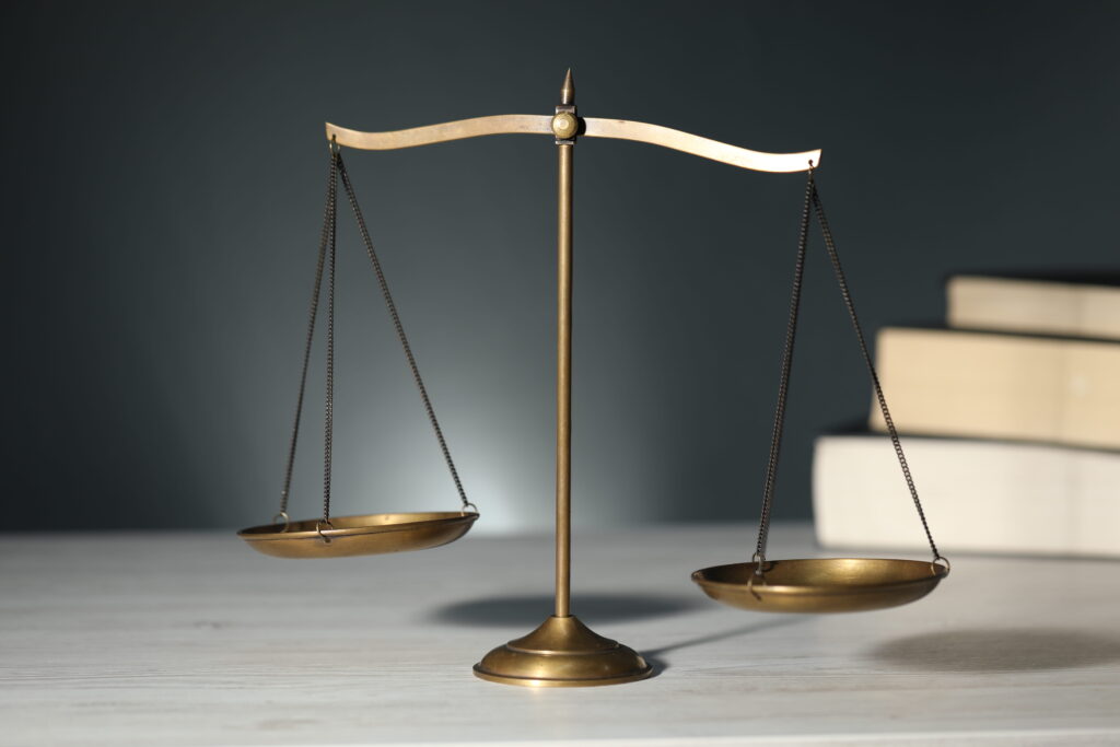 Scales of justice representing the legal process during the Santee bail bonds approval process and defendant release.