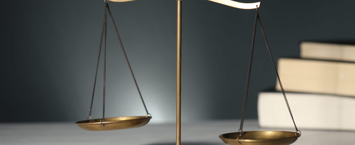 Scales of justice representing the legal process during the Santee bail bonds approval process and defendant release.