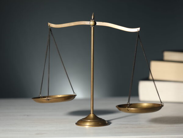 Scales of justice representing the legal process during the Santee bail bonds approval process and defendant release.