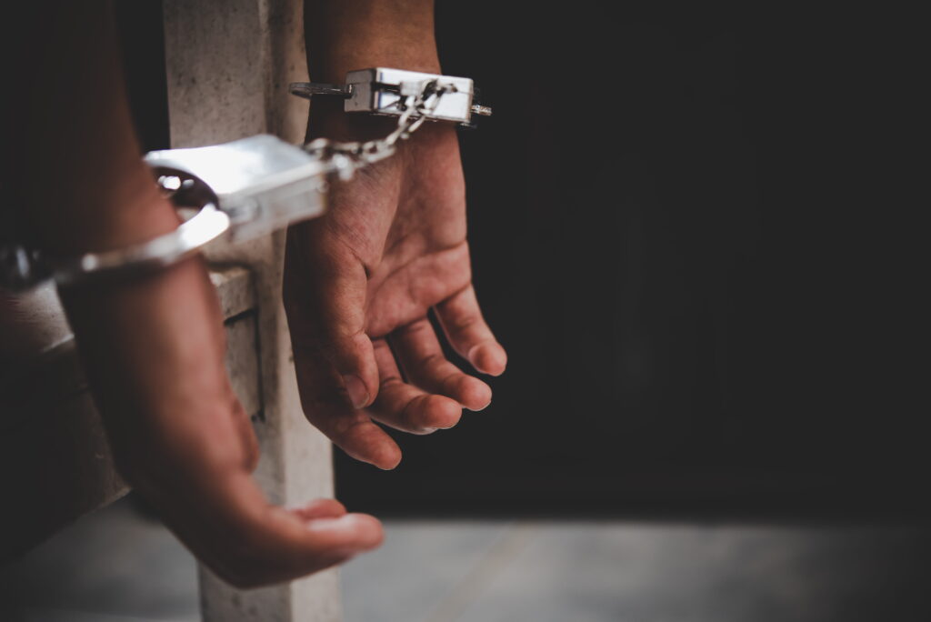 Man in handcuffs following an arrest in Santee, California