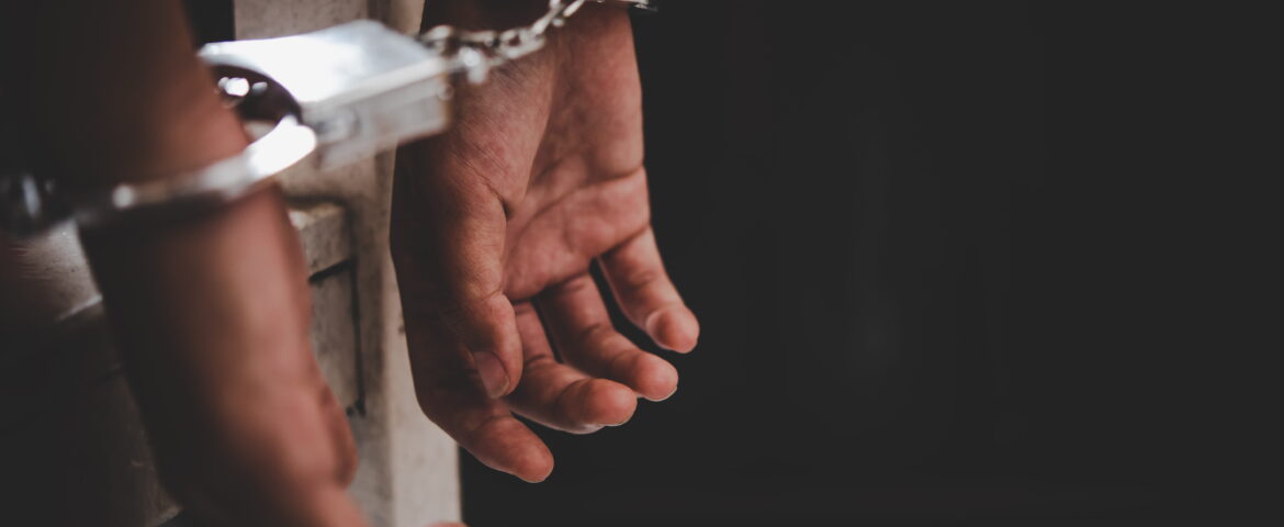 Man in handcuffs following an arrest in Santee, California