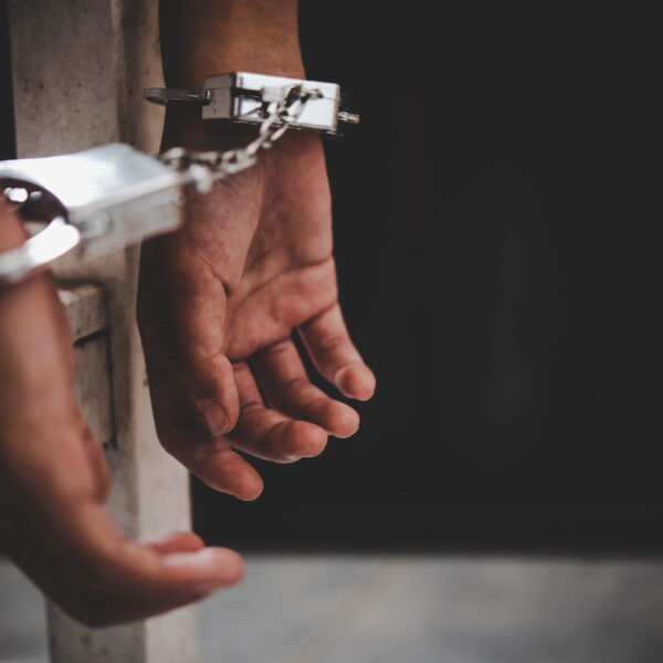 Man in handcuffs following an arrest in Santee, California